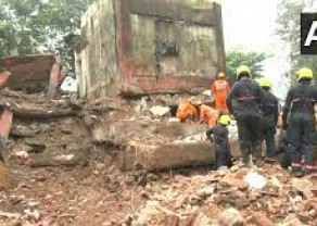The four-storey building collapsed and 22 people were trapped under debris.jpg